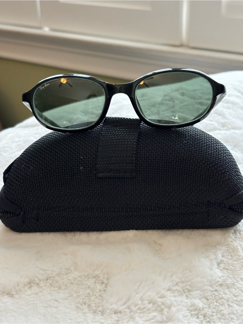 Ray-Ban Oval Sunglasses with Black Frame and Gray Lenses